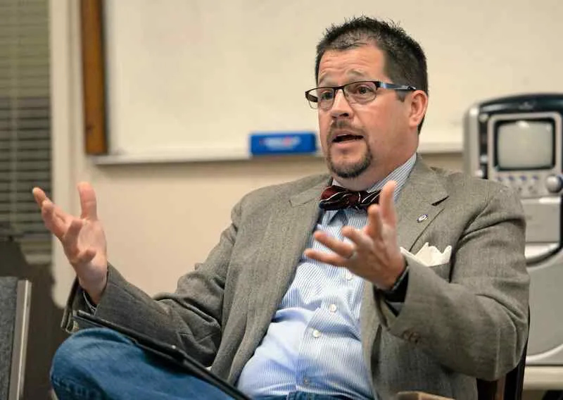 Randall Stone answering questions during a professional interview